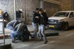 Bab el-Amoud. Israeli undercover policemen violently arrest a Palestinian youth during Ramadan